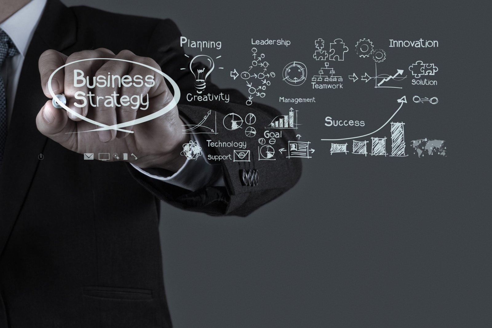 businessman hand working with new modern computer and business s businessman hand working with new modern computer and business strategy as concept